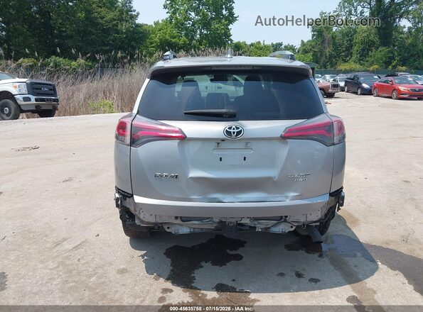 2T3DFREV3GW500328 2016 TOYOTA RAV4 Silver Front view