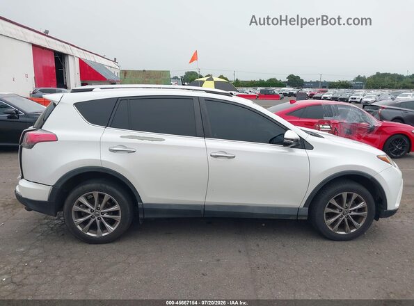 2T3DFREV3GW506047 2016 TOYOTA RAV4 Белый Вид задней части салона