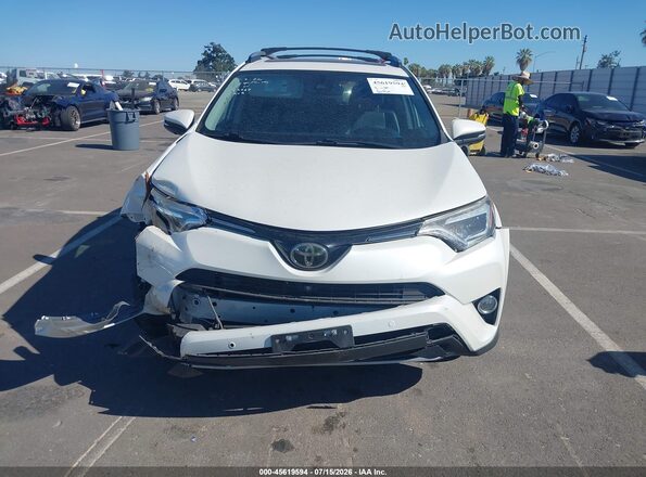 2T3DFREV3HW586354 2017 TOYOTA RAV4 White Vista interior trasera