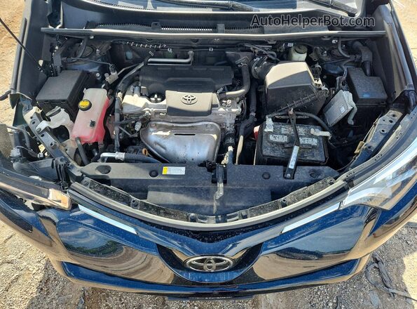 2T3DFREV3HW693002 2017 TOYOTA RAV4 Black Вид задньої частини салону
