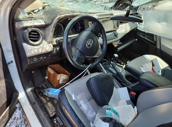 2T3DFREV6GW448872 2016 TOYOTA RAV4 White Dashboard view