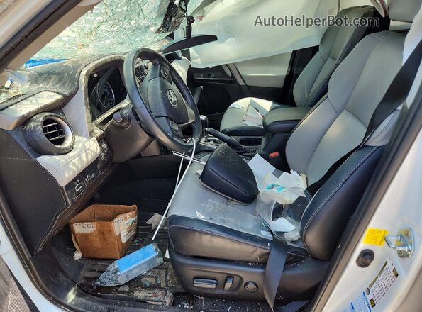 2T3DFREV6GW448872 2016 TOYOTA RAV4 White Front interior view