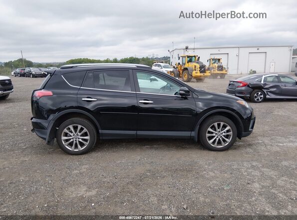 2T3DFREV7JW707974 2018 TOYOTA RAV4 Black Вид задньої частини салону