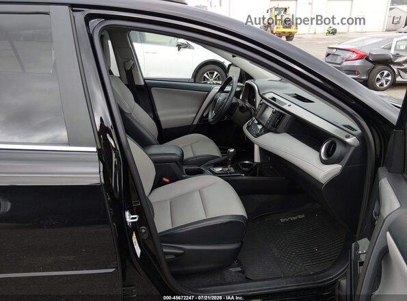 2T3DFREV7JW707974 2018 TOYOTA RAV4 Black Вид салону спереду
