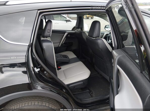 2T3DFREV7JW707974 2018 TOYOTA RAV4 Black Вид наклейки з VIN-кодом