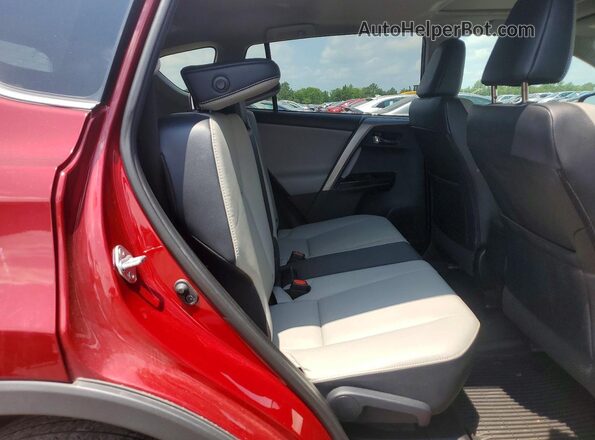 2T3DFREVXJW784015 2018 TOYOTA RAV4 Burgundy Widok wnętrza z tyłu