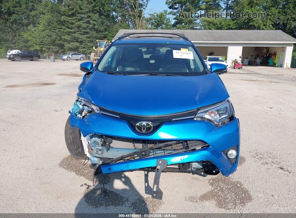 2T3DFREVXJW802643 2018 TOYOTA RAV4 Blue Vista interior trasera