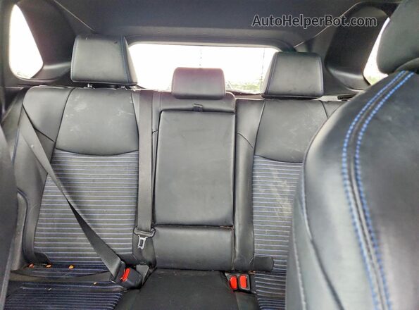 2T3E6RFV1RW050989 2024 TOYOTA RAV4 White Vista de los asientos traseros