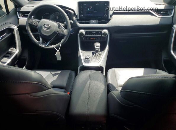 2T3E6RFV6MW025000 2021 TOYOTA RAV4 Белый Вид панели приборов