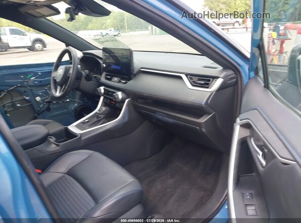 2T3E6RFV6PW043968 2023 TOYOTA RAV4 HYBRID Light Blue Widok wnętrza z przodu