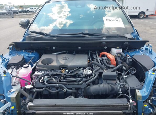 2T3E6RFV6PW043968 2023 TOYOTA RAV4 HYBRID Light Blue Widok z tyłu
