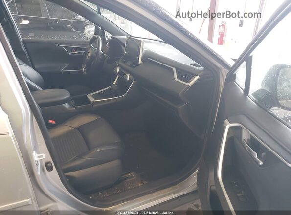 2T3E6RFV8NW037800 2022 TOYOTA RAV4 HYBRID Silver Vista interior delantera