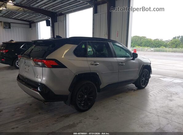 2T3E6RFV8NW037800 2022 TOYOTA RAV4 HYBRID Silver Trasero derecho