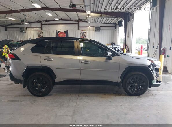 2T3E6RFV8NW037800 2022 TOYOTA RAV4 HYBRID Silver Vista interior trasera