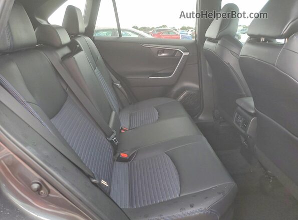 2T3E6RFV8PW045818 2023 TOYOTA RAV4 Charcoal Rear interior view