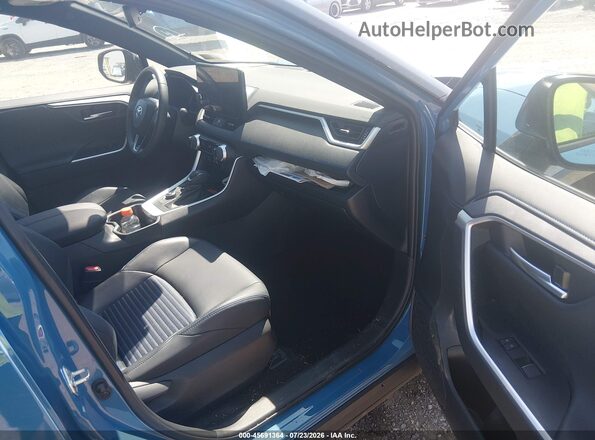 2T3E6RFV9RW053056 2024 TOYOTA RAV4 HYBRID Синий Вид салона спереди