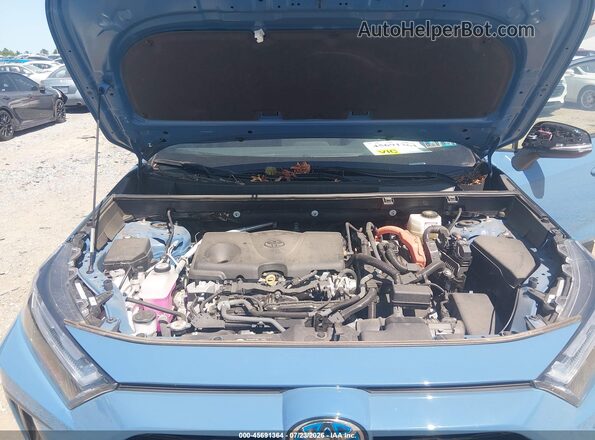 2T3E6RFV9RW053056 2024 TOYOTA RAV4 HYBRID Синий Вид сзади