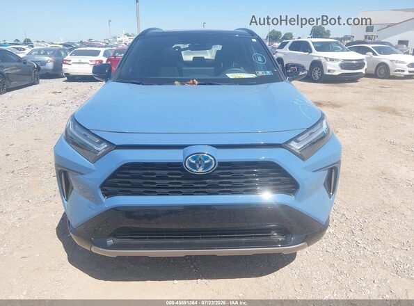 2T3E6RFV9RW053056 2024 TOYOTA RAV4 HYBRID Синий Вид щитка приборов