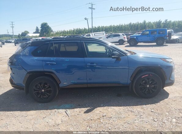 2T3E6RFV9RW053056 2024 TOYOTA RAV4 HYBRID Синий Вид задней части салона