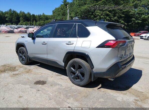 2T3EWRFV3KW028126 2019 TOYOTA RAV4 HYBRID Silver Trasero izquierdo