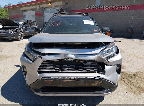 2T3EWRFV3KW028126 2019 TOYOTA RAV4 HYBRID Silver Vista interior trasera