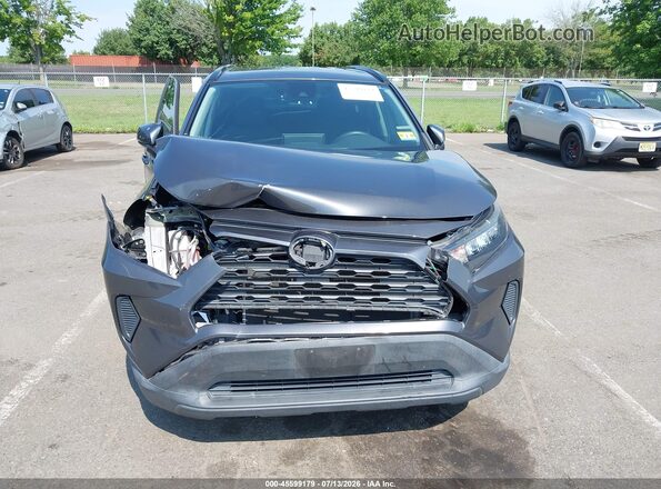2T3G1RFV6KW007567 2019 TOYOTA RAV4 Серый Вид задней части салона