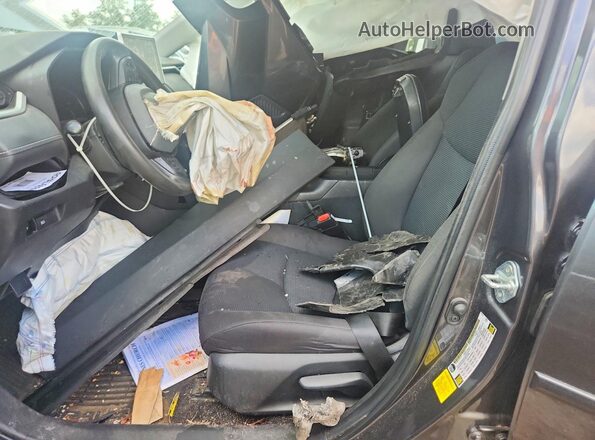 2T3G1RFV7PC372395 2023 TOYOTA RAV4 Gray Vista interior delantera