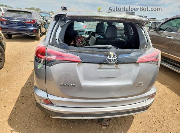 2T3JFREV1GW415118 2016 TOYOTA RAV4 Silver Вид ззаду