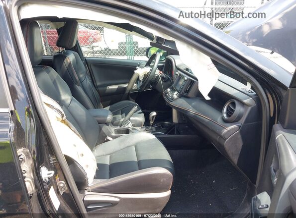 2T3JFREV1GW501187 2016 TOYOTA RAV4 Black Widok wnętrza z przodu
