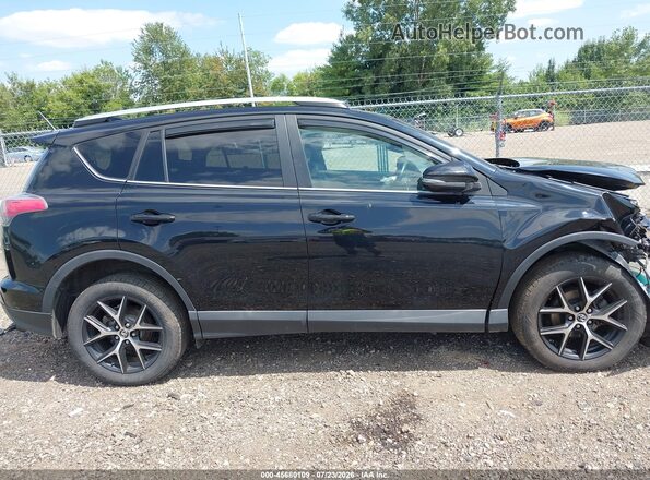 2T3JFREV1GW501187 2016 TOYOTA RAV4 Black Widok wnętrza z tyłu