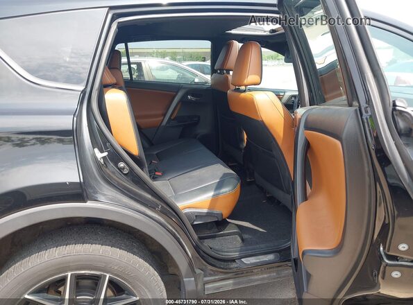 2T3JFREV1GW523464 2016 TOYOTA RAV4 Black Vista de la etiqueta del VIN