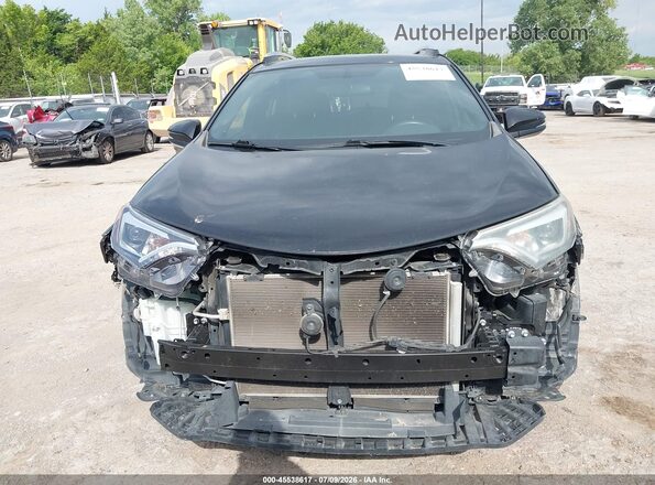 2T3JFREV4GW516461 2016 TOYOTA RAV4 Black Vista interior trasera