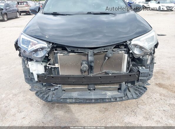 2T3JFREV4GW516461 2016 TOYOTA RAV4 Black Vista frontal
