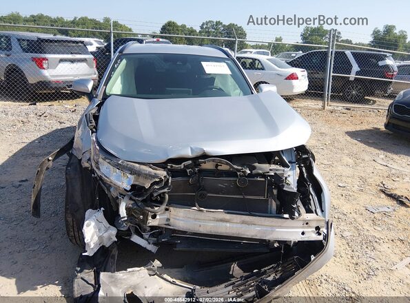 2T3MWRFV8LW096998 2020 TOYOTA RAV4 HYBRID Silver Widok wnętrza z tyłu