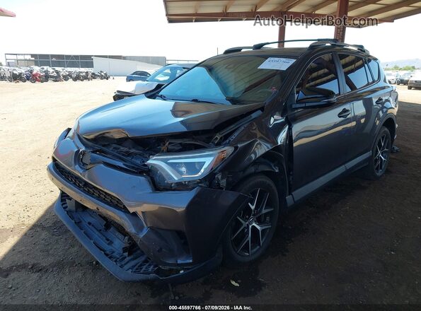 2T3NFREV1GW306613 2016 TOYOTA RAV4 Gray Vista tres cuartos delantera izquierda