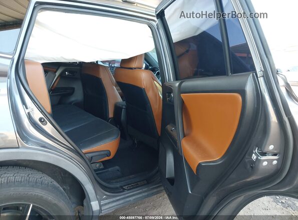 2T3NFREV1GW306613 2016 TOYOTA RAV4 Gray Vista de la etiqueta del VIN