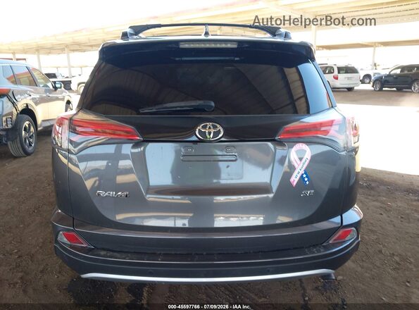 2T3NFREV1GW306613 2016 TOYOTA RAV4 Gray 