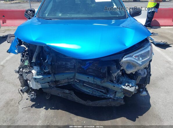2T3NFREV1JW503319 2018 TOYOTA RAV4 Blue Front view