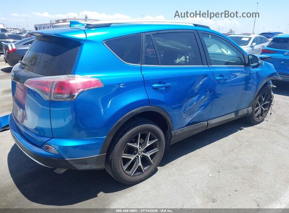 2T3NFREV1JW503319 2018 TOYOTA RAV4 Blue Rear right