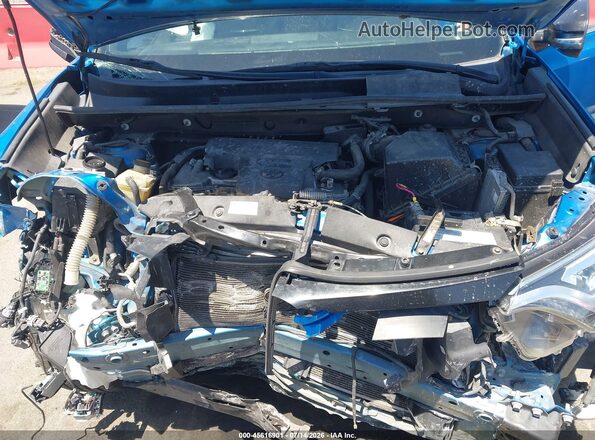 2T3NFREV1JW503319 2018 TOYOTA RAV4 Blue Rear view
