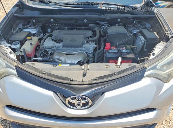 2T3NFREV3GW271637 2016 TOYOTA RAV4 Silver Vista interior trasera