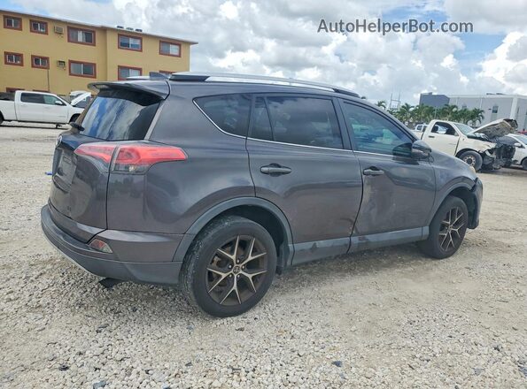 2T3NFREV7GW309712 2016 TOYOTA RAV4 Gray Trasero derecho