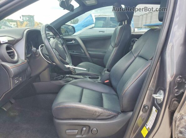 2T3NFREV7GW309712 2016 TOYOTA RAV4 Gray Vista interior delantera
