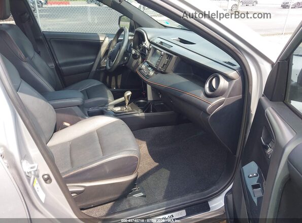 2T3NFREV9HW370724 2017 TOYOTA RAV4 Gray წინა სალონის ხედი