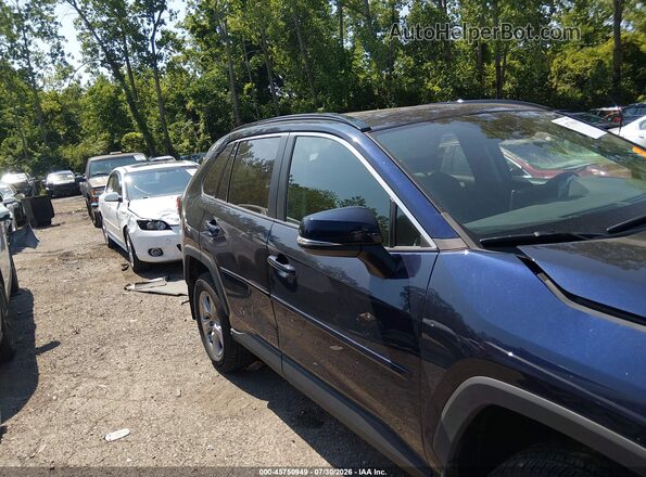 2T3P1RFV4PW334606 2023 TOYOTA RAV4 Синий Вид задней части салона