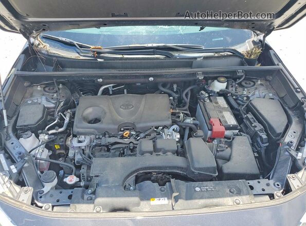 2T3P1RFV5PC328654 2023 TOYOTA RAV4 Charcoal Widok wnętrza z tyłu