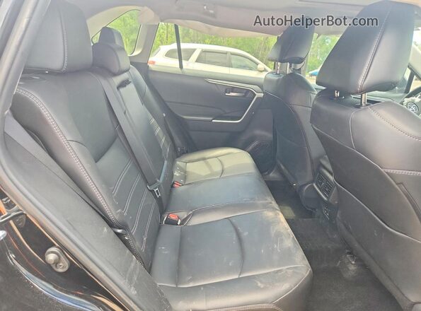 2T3R1RFV9RC483557 2024 TOYOTA RAV4 Black Vista interior trasera