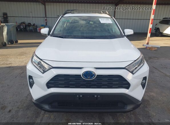 2T3R6RFV9MW016857 2021 TOYOTA RAV4 HYBRID White Rear interior view