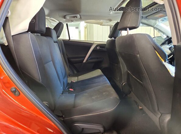 2T3RFREV0GW432172 2016 TOYOTA RAV4 Orange Vista interior trasera