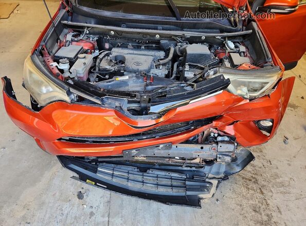 2T3RFREV0GW432172 2016 TOYOTA RAV4 Orange Vista del compartimento del motor
